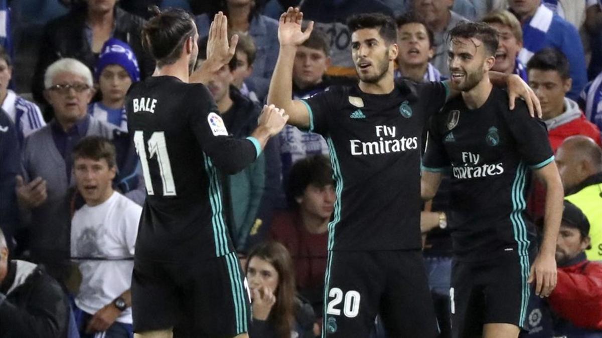 Bale y Mayoral celebrando un gol junto a Marco Asensio