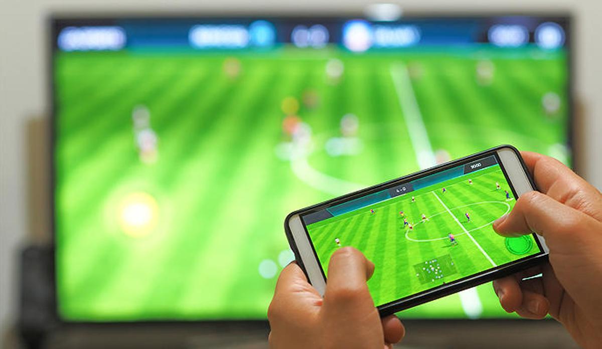 La interacción entre móvil y televisión una costumbre ya habitual.