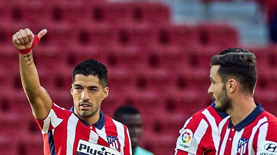 Luis Suárez celebra uno de sus goles.