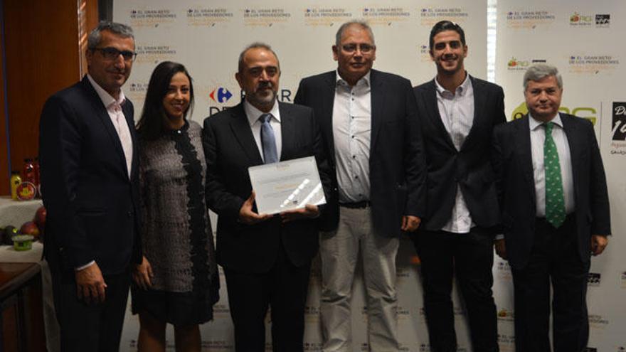 Los responsables de Reyes Gutiérrez recibiendo el premio.