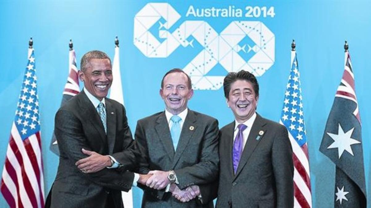 El presidente de EEUU, Barack Obama, y los primeros ministros de Australia, Tony Abbott, y Japón, Shinzo Abe, en un momento de la cumbre.