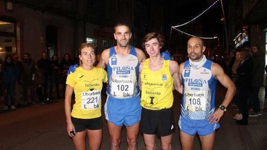 Beatriz Valiente, Manuel Álvarez, Diego Menéndez y José Miguel Redondo, tras la &quot;San Silvestre&quot; de Piloña.