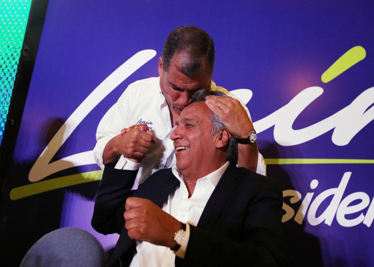 Ecuador’s President Rafael Correa (top) kisses Lenin Moreno, candidate of the ruling PAIS Alliance Party, at the Hotel Colon during the presidential election in Quito, Ecuador February 19, 2017. REUTERS/Mariana Bazo