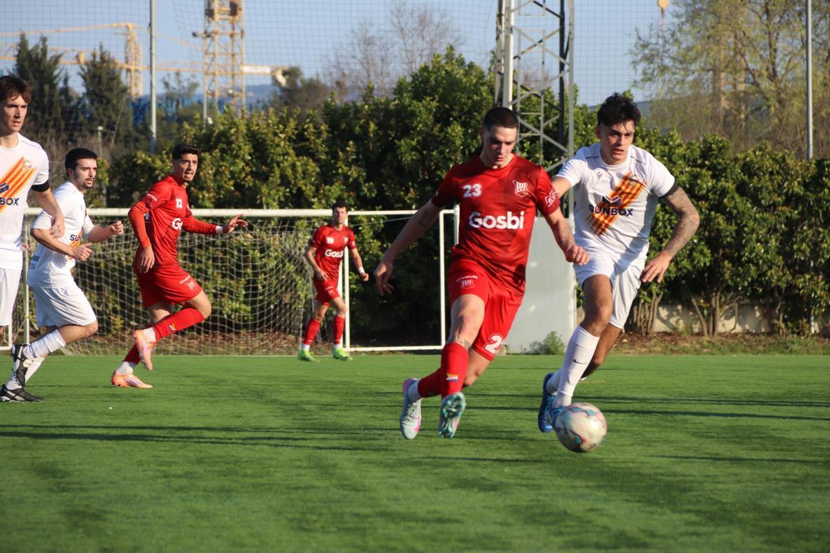 Un moment del partit.