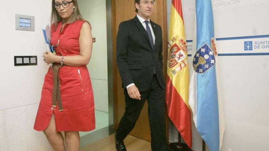 La conselleira de Facenda, Elena Muñoz, junto al presidente de la Xunta, Alberto Núñez Feijóo. // X. Álvarez