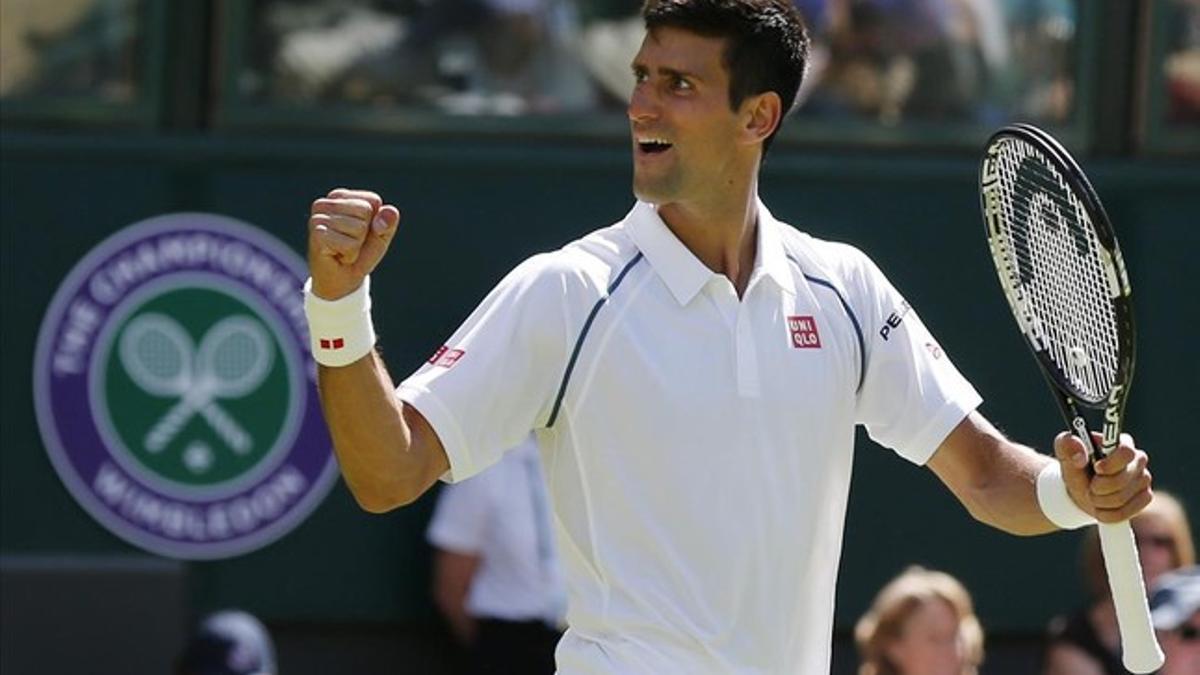 rpaniaguanovak djokovic of serbia celebrates after winning 150629171006