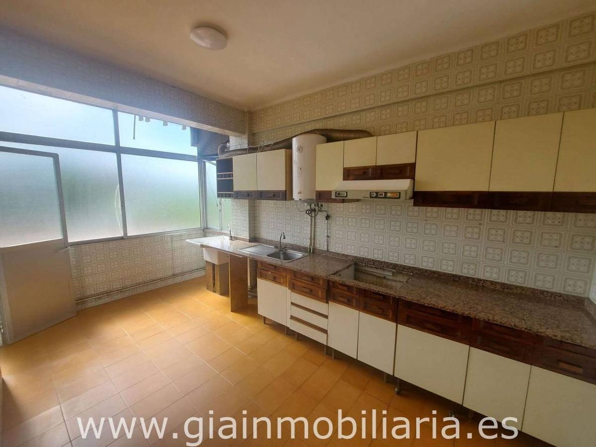 Una de las estancias del piso