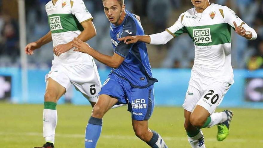 Mosquera y Fayçal, la pasada temporada con el Elche en la visita al Coliseum Alfonso Pérez de Getafe.