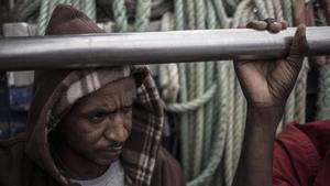 rjulve46098169 migrant sits aboard the spanish fishing vessel nuestra madre181201180504