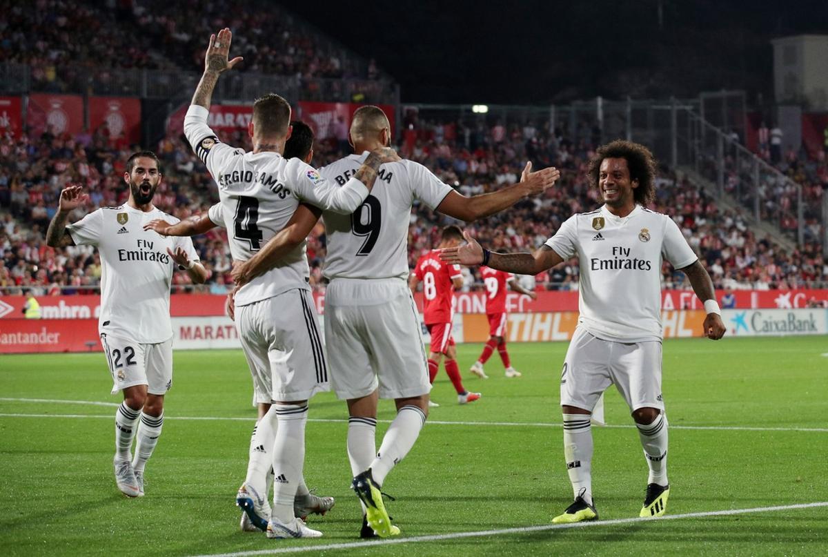 Soccer Football - La Liga Santander - Girona v Real Madrid - Montilivi  Girona  Spain - August 26  2018   Real Madrid s Karim Benzema celebrates scoring their second goal with teammates   REUTERS Albert Gea