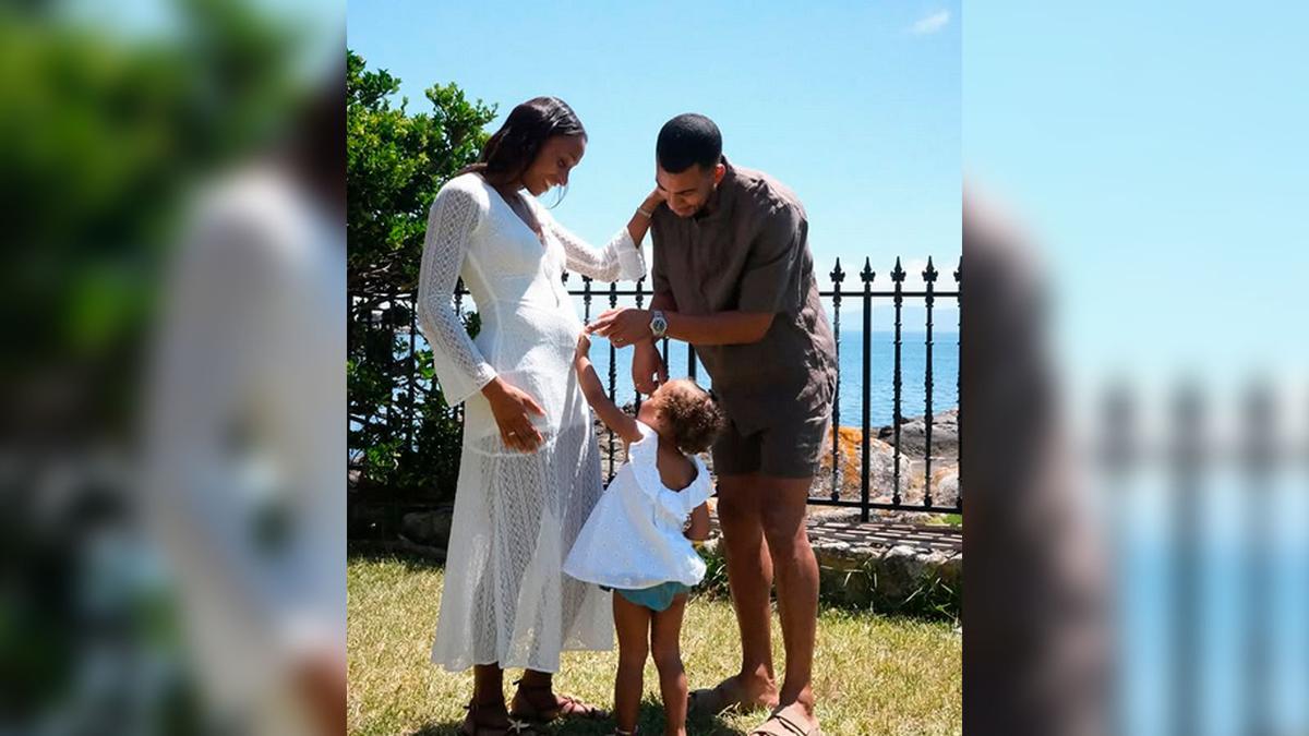 La atleta Ana Peleteiro junto a su pareja, Benjamin Compaoré, y la hija de ambos, Lúa.