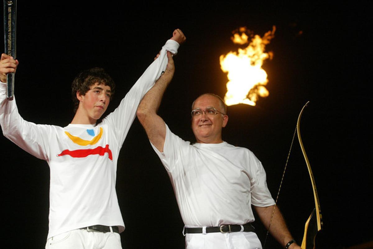 Antonio Rebollo y Yeray Hernández después del encendido del pebetero