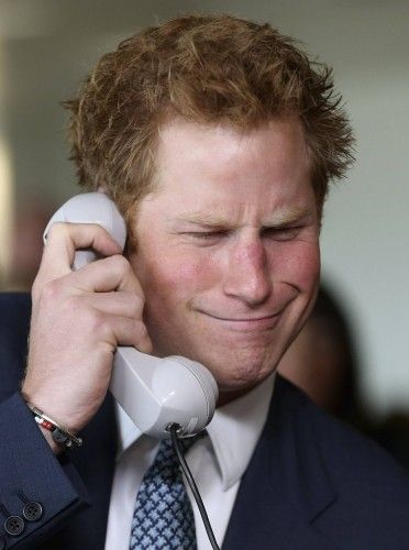 Britain's Prince Harry takes part in a trade on the trading floor of BGC Partners in London