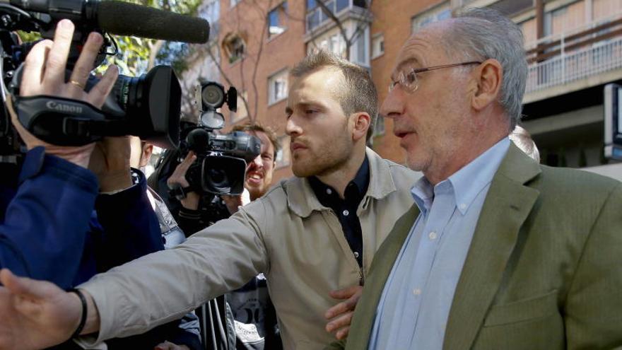 Rodrigo Rato, a la salida de su casa.