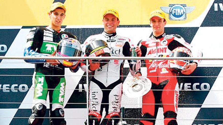 De izquierda a derecha, Luis Salom, Cortese y Zarco en el podio de 125cc.
