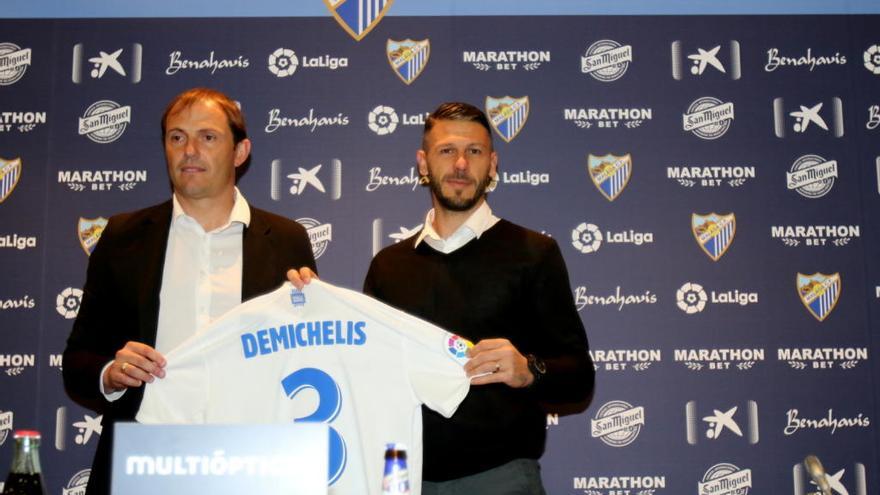 Arnau, junto a Demichelis.