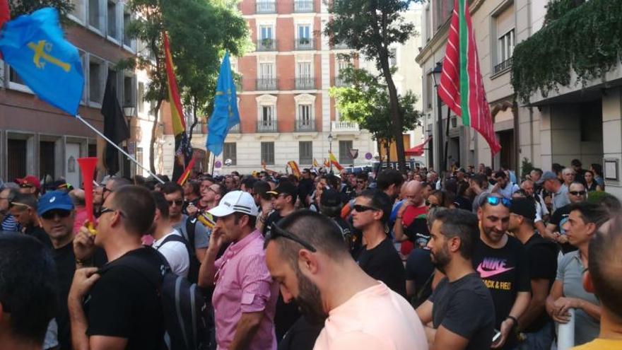 Un momento de la protesta de Jusapol hoy en Madrid.