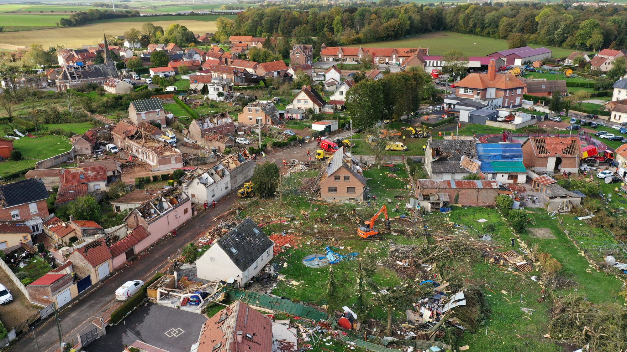 An aerial view shows damaged homes following a tornado in Bihucourt