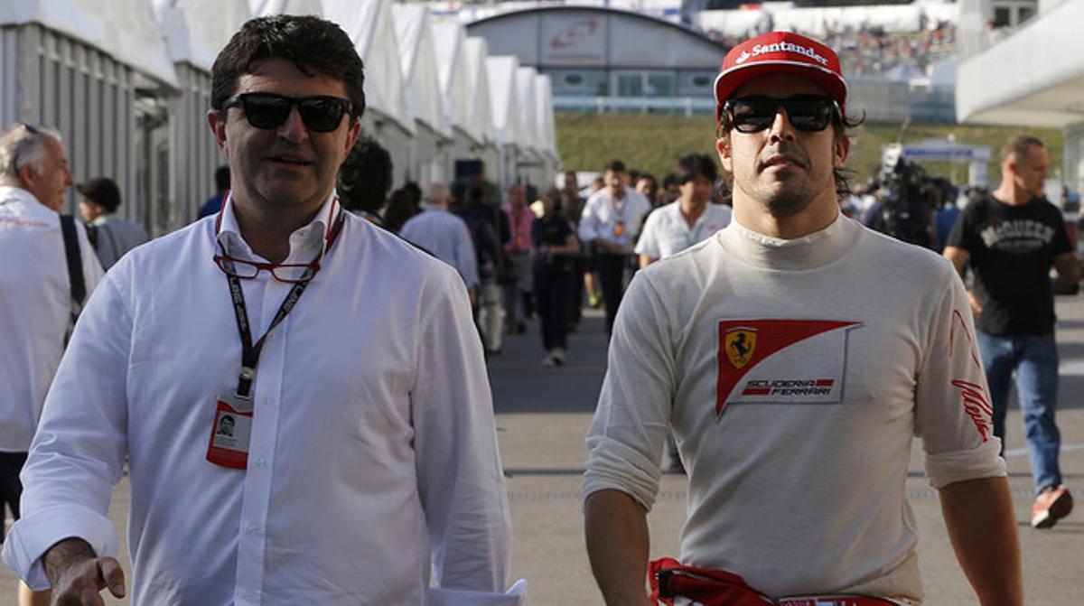 Fernando Alonso i el seu mànager, José Luis García Abad, a Suzuka el 2013, quan l’asturià encara era pilot de Ferrari. Fernando Alonso i el seu mànager, José Luis García Abad, a Suzuka el 2013, quan l’asturià encara era pilot de Ferrari.