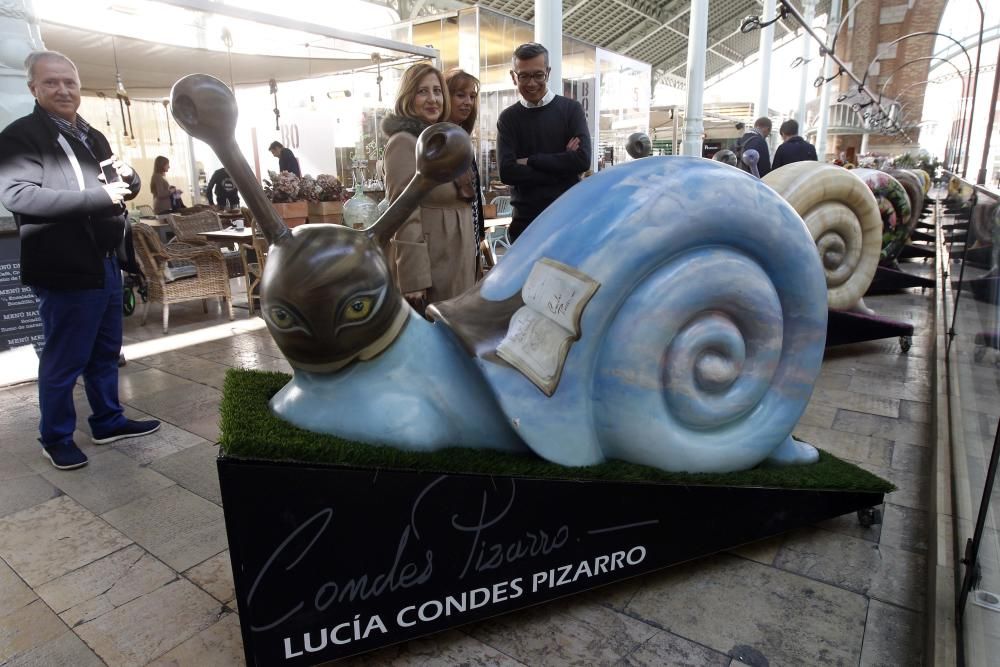 Exposición de caracoles gigantes en el mercado de Colón