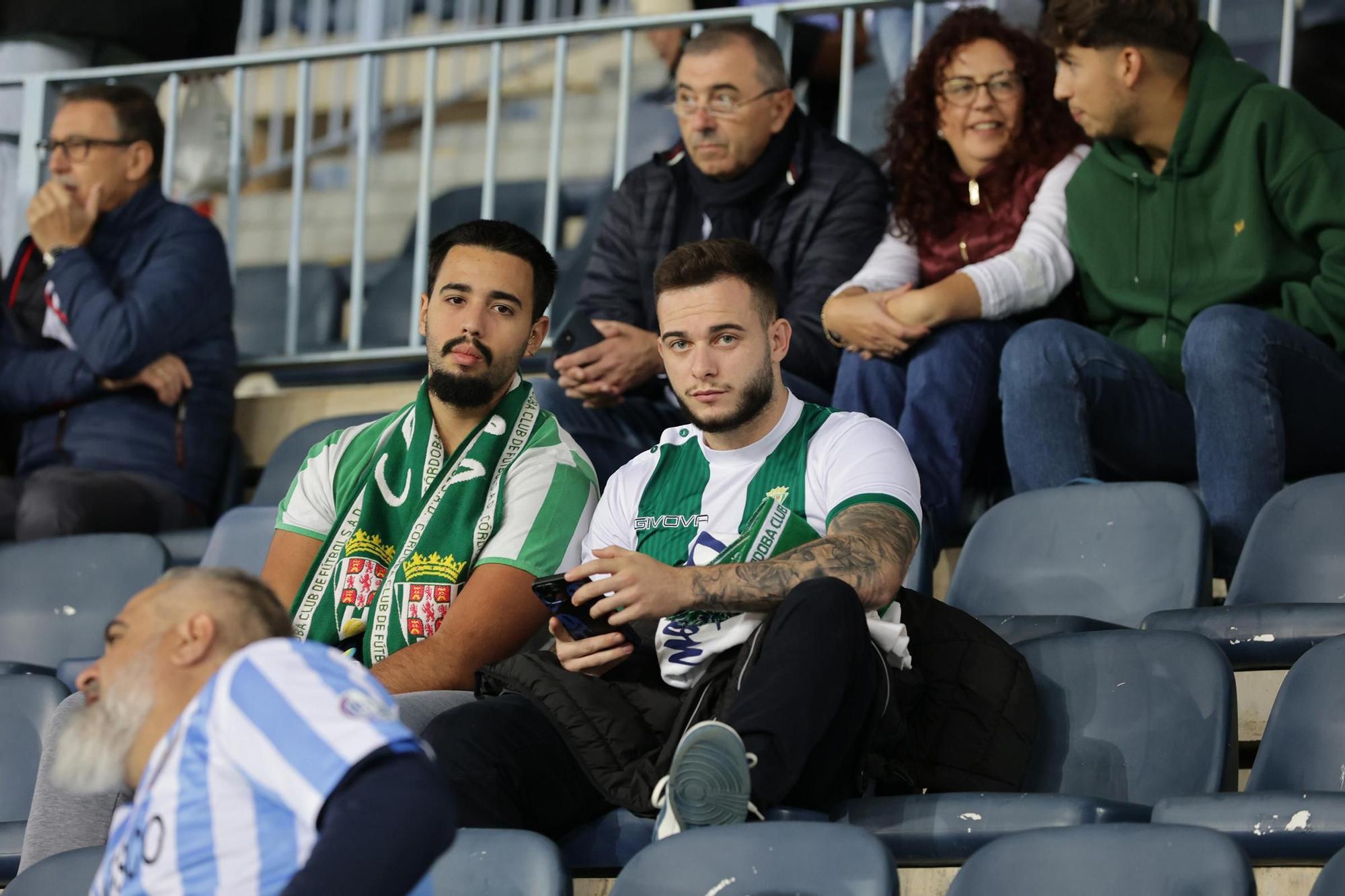 Málaga CF - Córdoba CF | Las imágenes de la afición cordobesista en el derbi en La Rosaleda