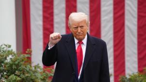 April 2, 2025, Washington, District of Columbia, USA: President DONALD TRUMP raises a fist during a ceremony where he signs two executive orders that will lead to reciprocal tariffs against other countries that charge tariffs on US goods