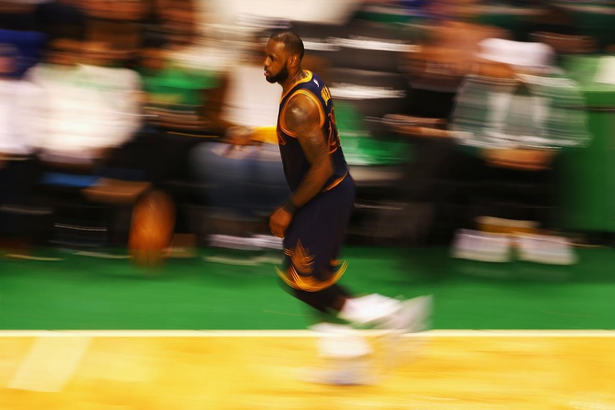 BOSTON, MA - MAY 25: LeBron James #23 of the Cleveland Cavaliers dribbles the ball in the second half against the Boston Celtics during Game Five of the 2017 NBA Eastern Conference Finals at TD Garden on May 25, 2017 in Boston, Massachusetts. NOTE TO USER: User expressly acknowledges and agrees that, by downloading and or using this photograph, User is consenting to the terms and conditions of the Getty Images License Agreement.   Adam Glanzman/Getty Images/AFP