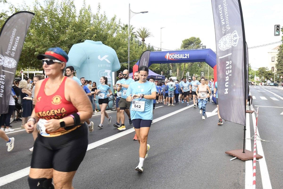 La carrera y marcha Solidaria Asteamur, en imágenes