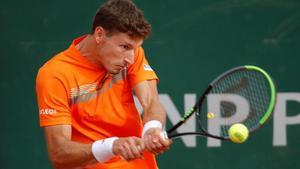 Carreño, en acción ante Bautista, en Roland Garros.