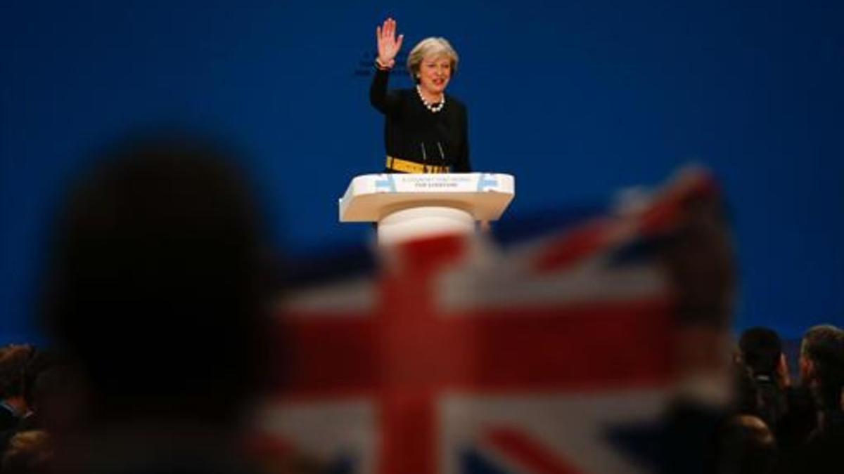 Theresa May durante su intervención en el congreso del Partido Conservador, ayer, en Birmingham.