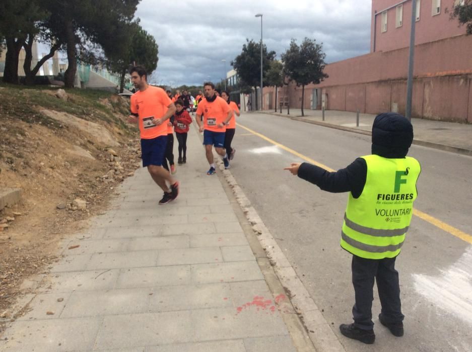 Mig miler d''atletes a la Run 4 Càncer de Figueres