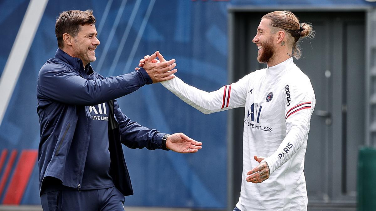 Mauricio Pochettino, junto a Sergio Ramos