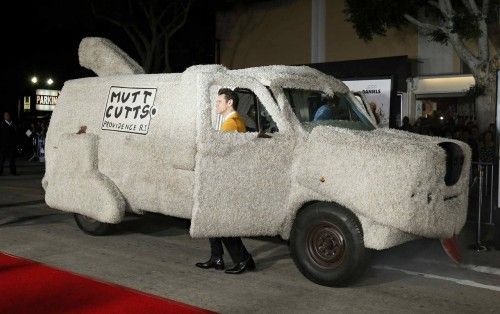 Carrey and Daniels arrive in a van decorated as a dog at the world premiere of the film "Dumb and Dumber To" in Los Angeles