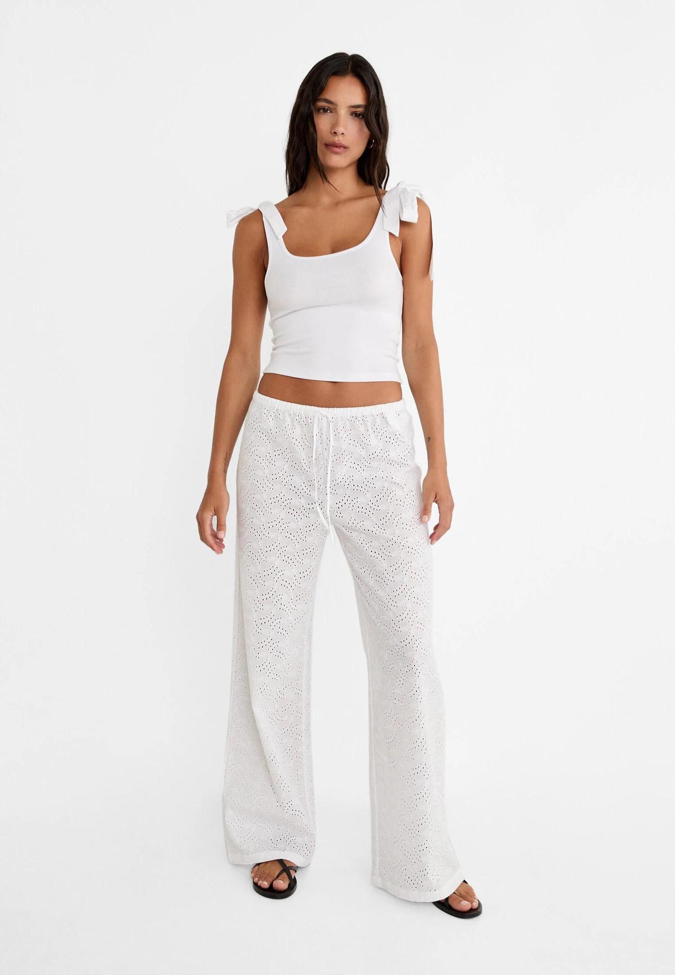 Pantalón de vestir blanco bordado con cintura elástica de Stradivarius