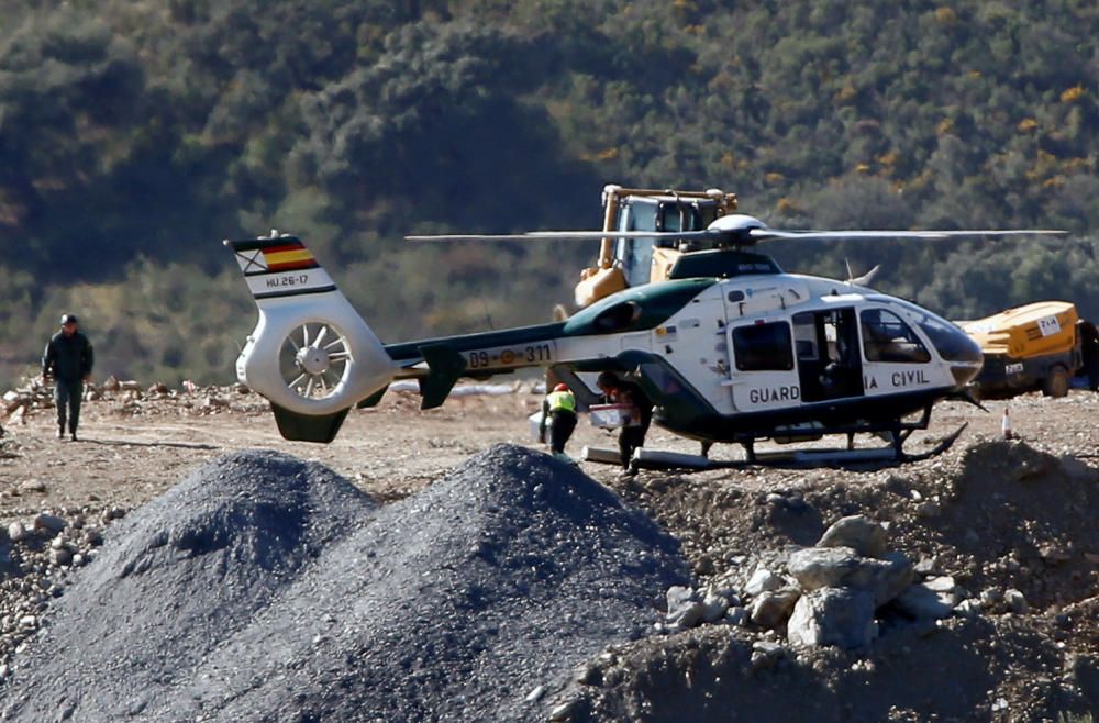 A Spanish Civil Guard helicopter is seen after ...