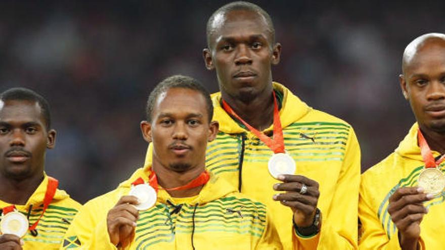 El 4x100 jamaicano con Nesta Carter y Usain Bolt