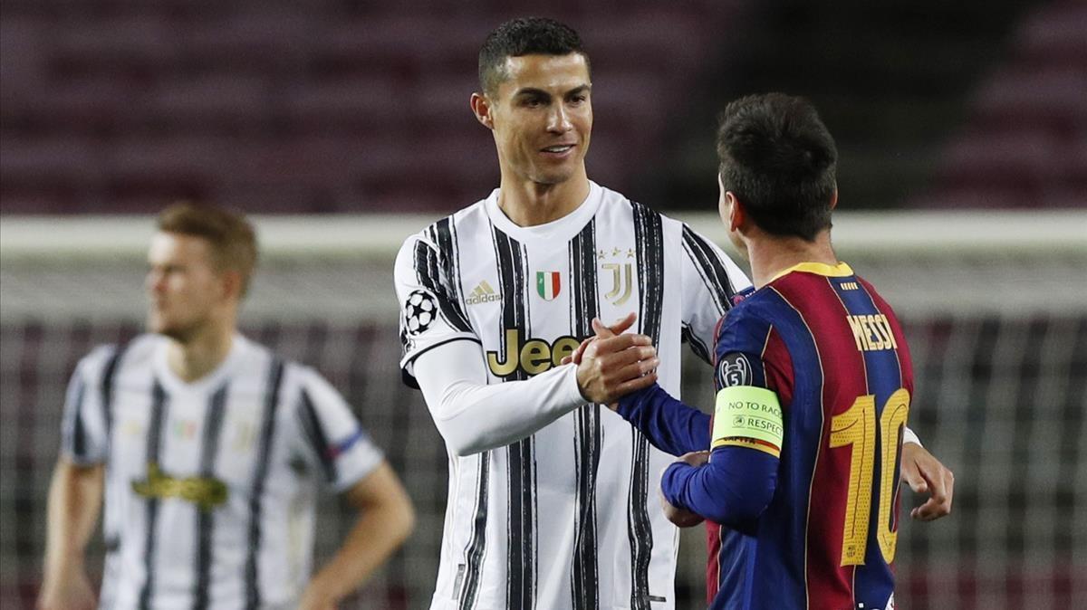 Soccer Football - Champions League - Group G - FC Barcelona v Juventus - Camp Nou  Barcelona  Spain - December 8  2020 Juventus  Cristiano Ronaldo with FC Barcelona s Lionel Messi before the match REUTERS Albert Gea