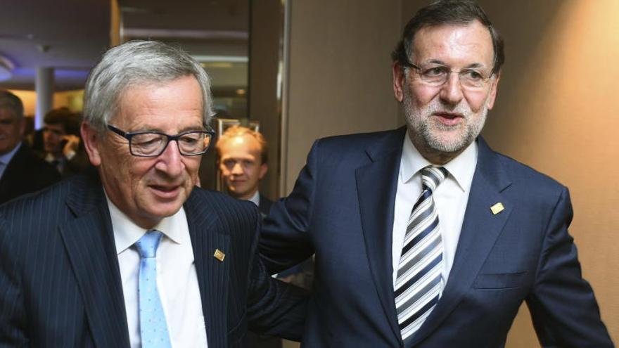 El presidente de la Comisión, Juncker, con Rajoy, en 2014.