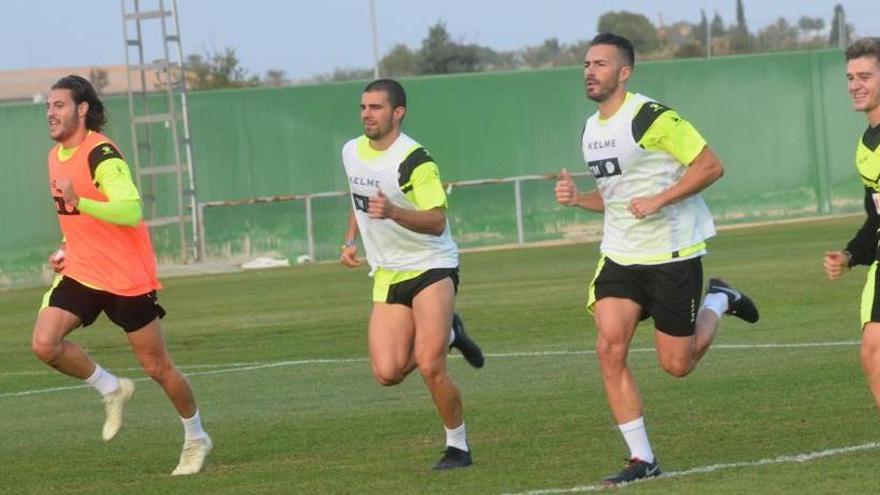 Alexander, esta tarde, esprintando junto a Juan Cruz y Xavi Torres