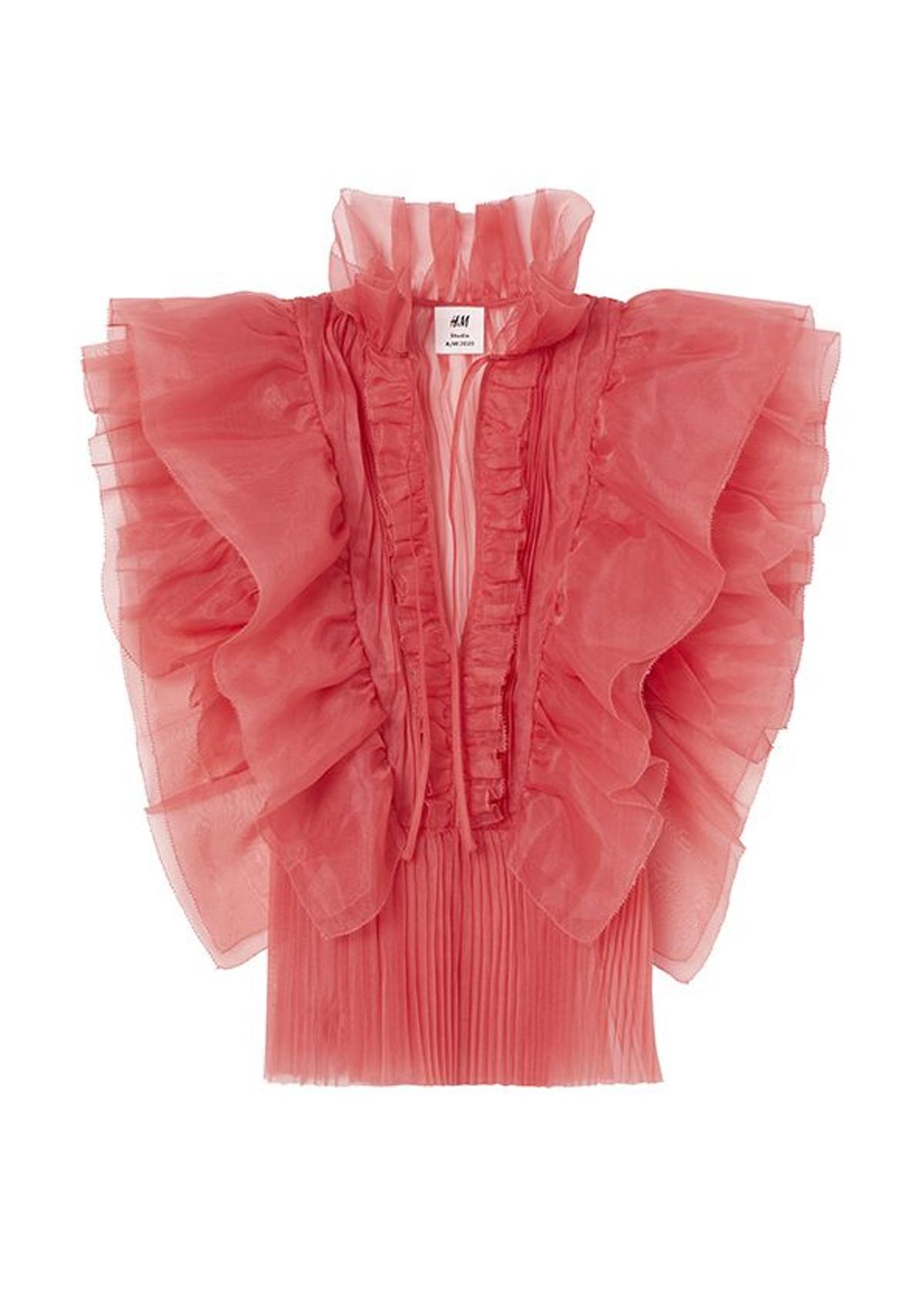 Top con volantes, hecho un 72% de materiales reciclados, de H&M Studio (89,99 €).