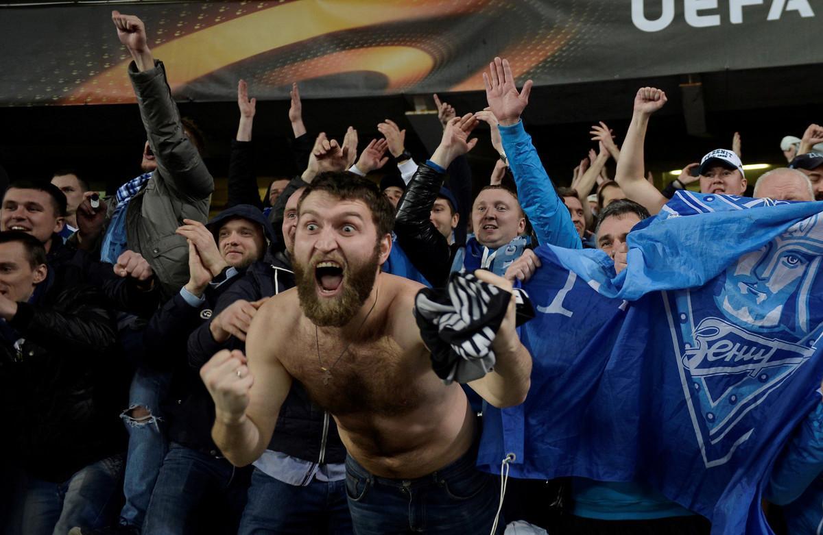 Soccer Football - Europa League - Real Sociedad vs Zenit Saint Petersburg - Anoeta Stadium, San Sebastian, Spain - December 7, 2017 Zenit St. Petersburg fans celebrate after the match REUTERS/Vincent West TPX IMAGES OF THE DAY Soccer Football - Europa League - Real Sociedad vs Zenit Saint Petersburg - Anoeta Stadium, San Sebastian, Spain - December 7, 2017 Zenit St. Petersburg fans celebrate after the match REUTERS/Vincent West TPX IMAGES OF THE DAY