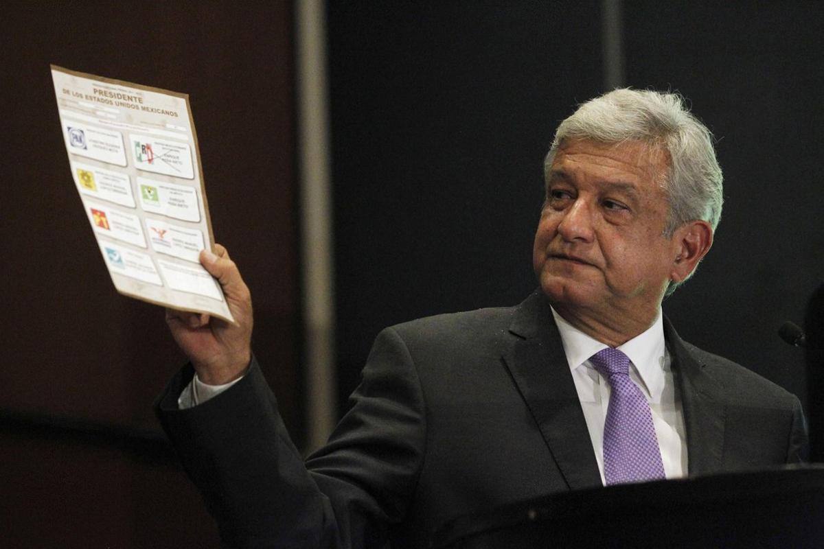 Andres Manuel Lopez Obrador presidential candidate for the Party of the Democratic Revolution PRD shows a ballot during a news conference in Mexico city July 12 2012 The runner-up in Mexico s presidential election said on Thursday he will ask the country s electoral tribunal to void the results arguing that the winner broke campaign finance laws to buy votes Lopez Obrador came in 3 3 million votes behind Enrique Pena Nieto from the centrist Institutional Revolutionary Party PRI according to the official count from the July 1 vote REUTERS Edgard Garrido MEXICO - Tags POLITICS ELECTIONS Andres Manuel Lopez Obrador presidential candidate for the Party of the Democratic Revolution PRD shows a ballot during a news conference in Mexico city July 12 2012 The runner-up in Mexico s presidential election said on Thursday he will ask the country s electoral tribunal to void the results arguing that the winner broke campaign finance laws to buy votes Lopez Obrador came in 3 3 million votes behind Enrique Pena Nieto from the centrist Institutional Revolutionary Party PRI according to the official count from the July 1 vote REUTERS Edgard Garrido MEXICO - Tags POLITICS ELECTIONS