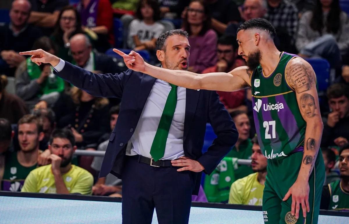 Ibon Navarro, junto a Chris Duarte.