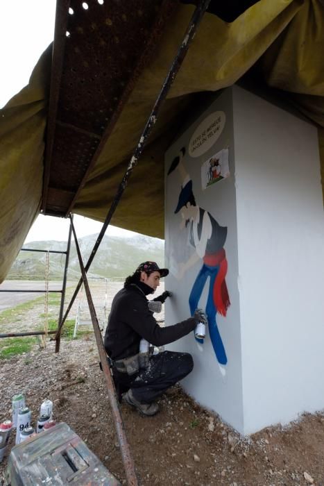 Trabajo de pintura en el monolito de la cima Angli