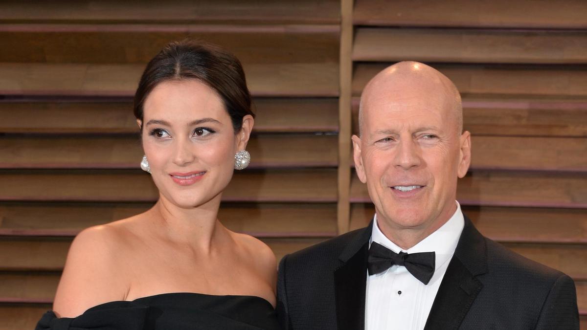 Bruce Willis y Emma Heming en la fiesta de los Oscar 2014