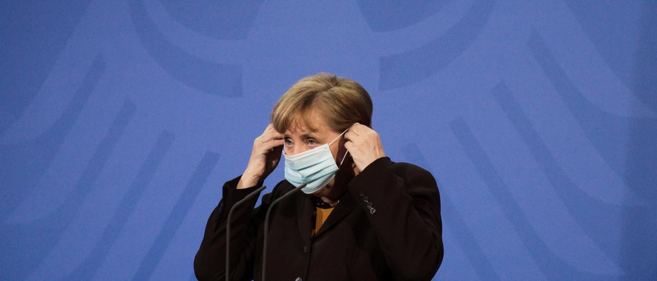 FILE PHOTO: German Chancellor Angela Merkel briefs the media after a virtual meeting with federal state governors at the chancellery in Berlin