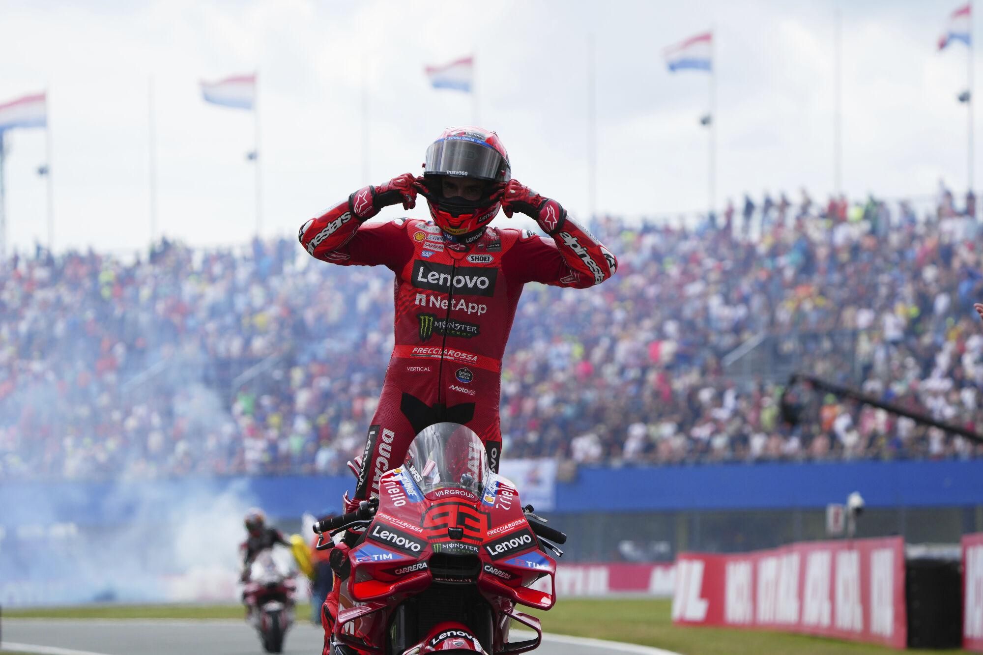Spain's rider Marc Marquez of the Ducati Lenovo Team celebrates after winning the MotoGP race at the Grand Prix of the Netherlands at the TT Circuit in Assen, northern Netherlands, Sunday, June 29, 2025. (AP Photo/Peter Dejong)