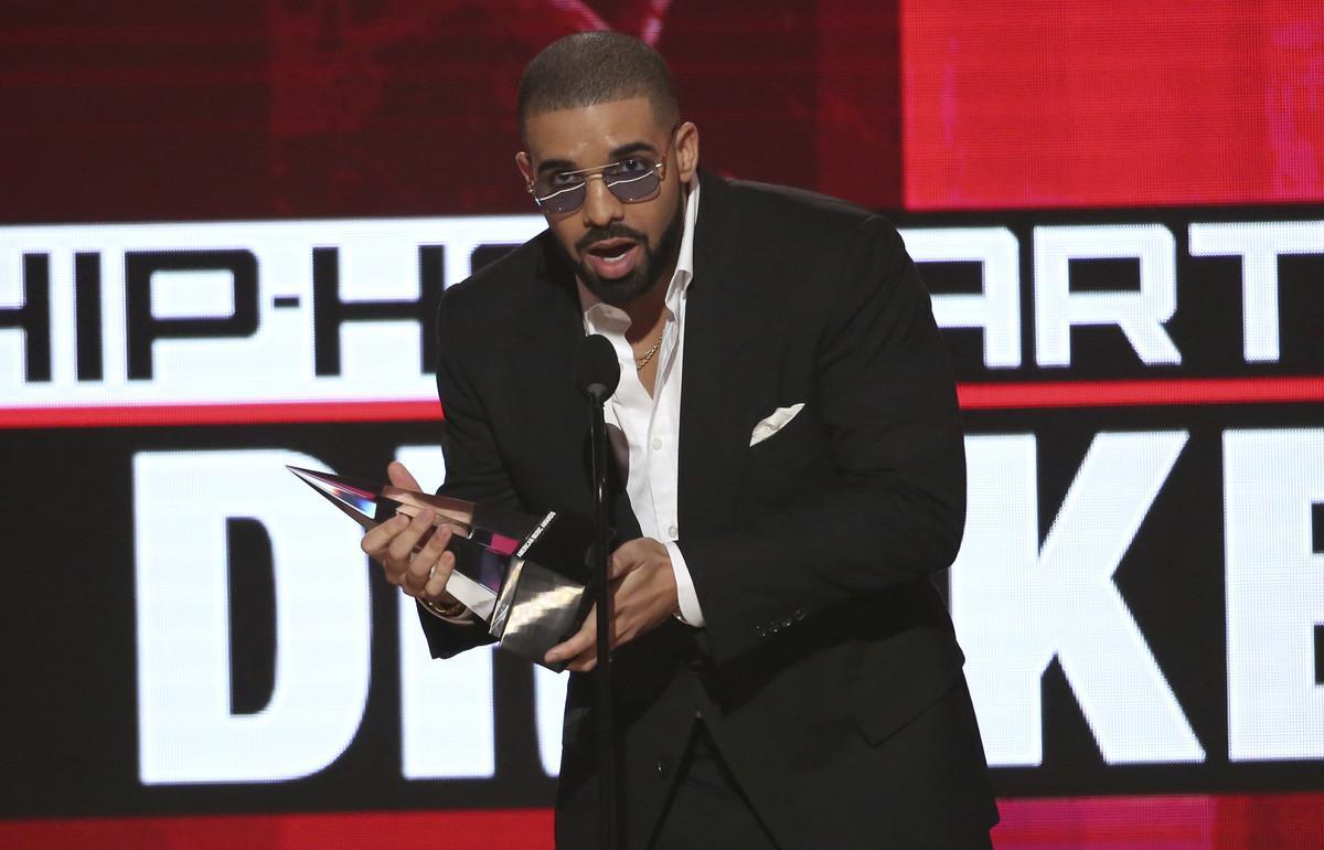 Drake accepts the award for favorite artist - rap/hip-hop at the American Music Awards at the Microsoft Theater on Sunday, Nov. 20, 2016, in Los Angeles. (Photo by Matt Sayles/Invision/AP)