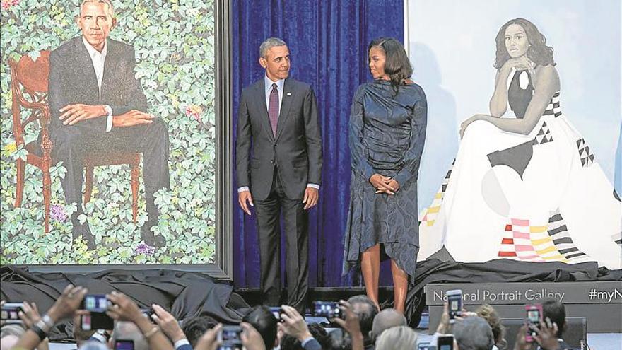 Los Obama destapan sus retratos oficiales