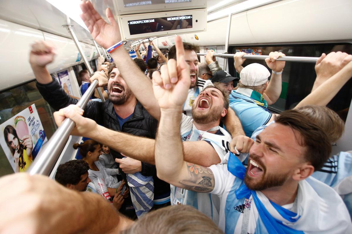 Soccer Football - World Cup - Group D - Nigeria v Argentina - Saint Petersburg Stadium, Saint Petersburg, Russia - June 26, 2018 Argentina’s fans celebrate after the match in a subway car. REUTERS/Anton Vaganov